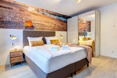 Schlafzimmer Bernsteinquartier, Whg. 05.56 "Meeresgold"