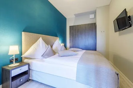 4 Ferienwohnung Columbus Suite Ostseebad Wustrow ZweiWasser Alte Seefahrtschule Schlafzimmer  Columbus Suite