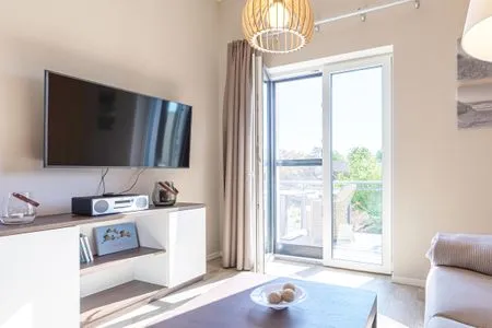 Ferienwohnung Magelan Suite Ostseebad Wustrow ZweiWasser Alte Seefahrtschule Wohnzimmer  Magelan Suite