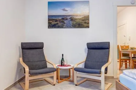 Wohnzimmer Haus Barnheide, Whg. Strandkorb