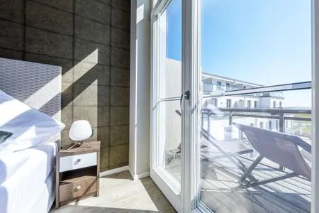 Ferienwohnung Ostseequartier Ostseebad Wustrow Schlafzimmer mit Balkon  Ostseequartier