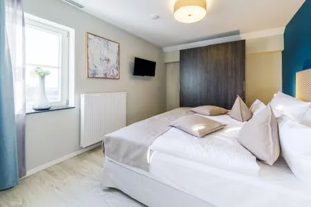 4 Ferienwohnung Sonnenaufgang Ostseebad Wustrow ZweiWasser Alte Seefahrtschule Schlafzimmer  Sonnenaufgang