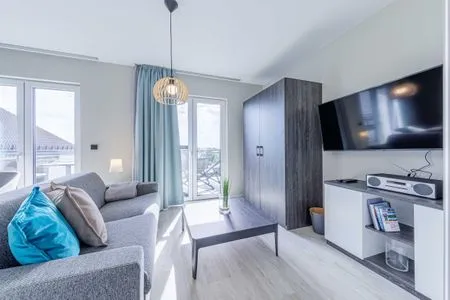 Ferienwohnung Sommerbrise Ostseebad Wustrow ZweiWasser Alte Seefahrtschule Helles Wohnzimmer  Sommerbrise