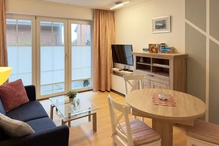 Wohnzimmer der Ferienwohnung Südspitze 18/3 in Wittdün auf Amrum Haus *Südspitze 18* Ferienwohnung "Südspitze 18/3"