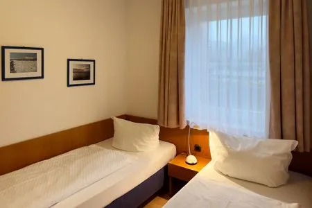 Schlafzimmer der Ferienwohnung Südspitze 18/3 in Wittdün auf Amrum Haus *Südspitze 18* Ferienwohnung "Südspitze 18/3"