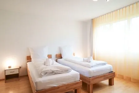 Bedroom Haus Gmür - Zimmer im Erdgeschoss