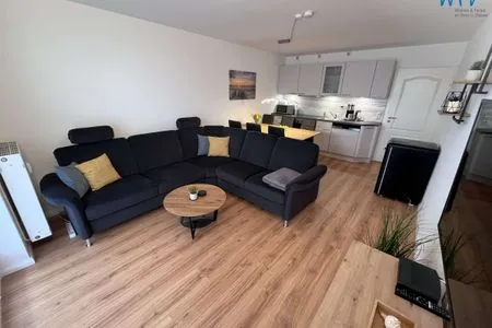 Wohnzimmer Am Mönchgraben 2 Ferienwohnung Familie und Meer