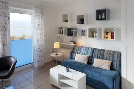 Wohnzimmer Haus *Südspitze 34* Ferienwohnung „Südspitze 34/23 - Schlieter"