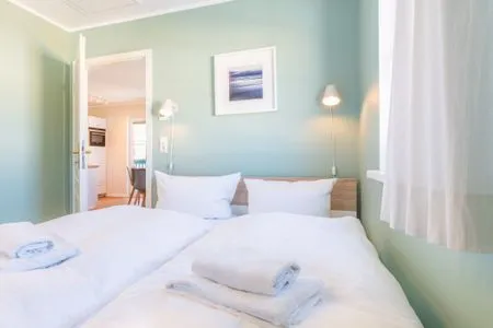 Schlafzimmer Ferienwohnung Strand 8