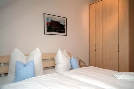 Schlafzimmer Doppelbett Residenz am Strand Wohnung 1-16