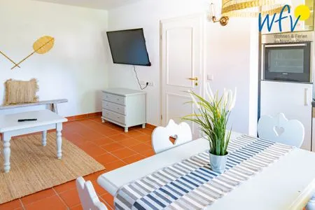 Wohnzimmer Ferienhaus am Gutspark Dranske Ferienwohnung Küstenklee