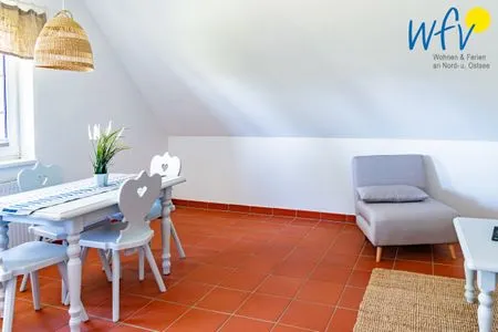 Wohnzimmer Ferienhaus am Gutspark Dranske Ferienwohnung Küstenklee