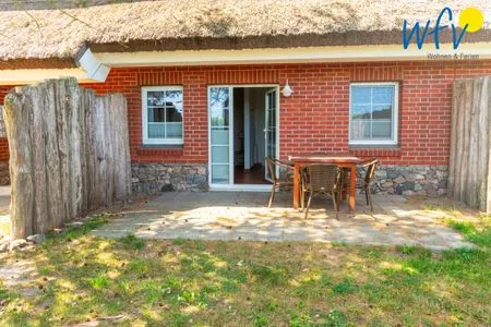 Terrasse Ferienhaus am Gutspark Dranske Ferienwohnung Sonnengarten