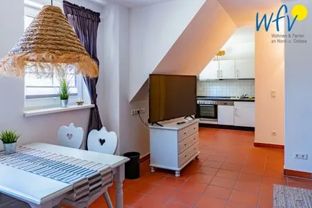 Wohnzimmer Ferienhaus am Gutspark Dranske Ferienwohnung Sonnenliebe
