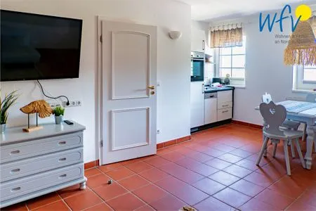 Wohnzimmer Ferienhaus am Gutspark Dranske Ferienwohnung Sonnenmorgen