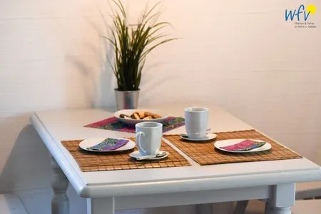 Essbereich Ferienhaus am Gutspark Dranske Ferienwohnung Silbergras
