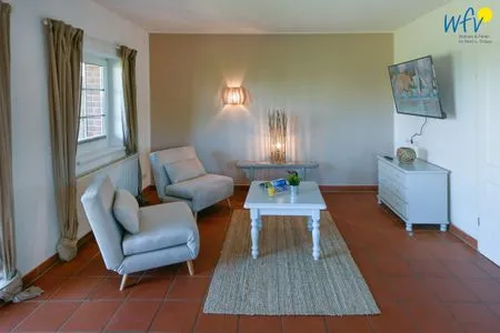 Wohnzimmer Ferienhaus am Gutspark Dranske Ferienwohnung Silbergras