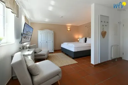 Schlafzimmer Ferienhaus am Gutspark Dranske Ferienwohnung Sandglöckchen