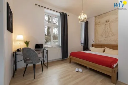 Schlafzimmer Villa Sanssouci Ferienwohnung Kirschblüte