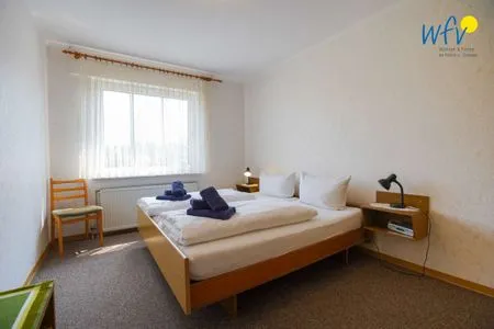 Schlafzimmer Hus Fentje Ferienwohnung 2