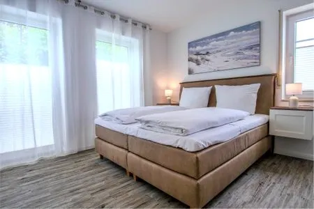 Schlafzimmer mit Doppelbett Parkresidenz am Hafen Wohnung HF 23 - "Viento"