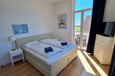 Schlafzimmer Haus Carl Stegmann Ferienwohnung FADAMA-HIN