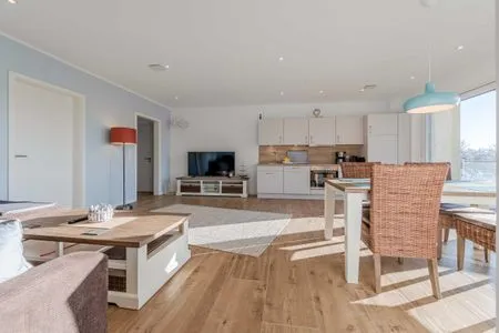 Ferienwohnung Wasserlilie Malchow Blick auf die Küche und den offenen Wohnbereich  Wasserlilie