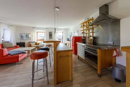 Ferienwohnung Hafenloge Waren (Müritz) - Wohnzimmer mit mondäner Aussicht  Hafenloge