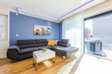 Ferienwohnung SeeGlück Wohnbereich mit Zugang zum Balkon  SeeGlück