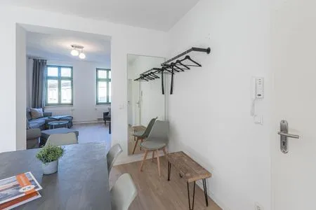 Ferienwohnung Family Suite Esstisch im Wohnbereich  Family Suite