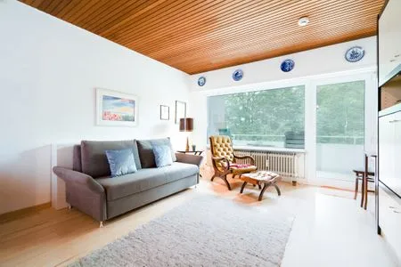 Wohnzimmer Sonnige Ferienwohnung im Kapitäns-Stil