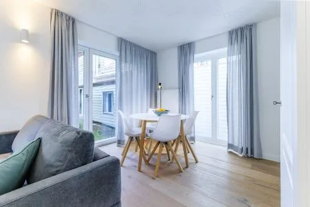 Wohnzimmer Haffperle - Meerblau - zentral in Haffkrug, nur wenige Schritte zum Strand