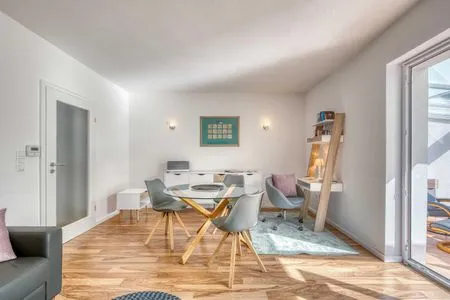 Ferienwohnung Eddi Wohnbereich mit einem Arbeitsplatz  Eddi