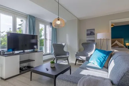 Ferienwohnung Lüttkoje Ostseebad Wustrow - ZweiWasser Alte Seefahrtschule Wohnzimmer  Lüttkoje