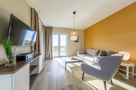 Ferienwohnung Boddenstuv Ostseebad Wustrow - ZweiWasser Alte Seefahrtschule Wohnzimmer  Boddenstuv