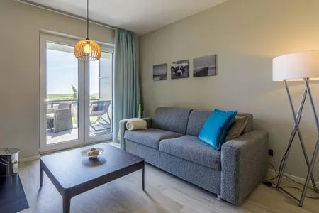 2 Ferienwohnung Große Strandmuschel Ostseebad Wustrow ZweiWasser Alte Seefahrtschule Wohnbereich  Große Strandmuschel
