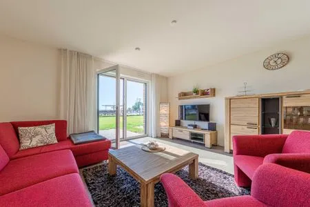 Ferienwohnung Libelle Hafenresidenz Waren (Müritz) - Wohnzimmer mit Sofa  Libelle