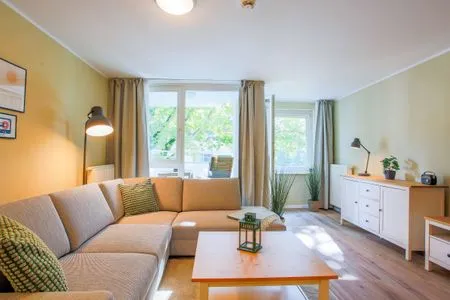 Ferienwohnung Meereswoge Zingst Aparthotel Zingst - Wohnzimmer  Meereswoge Zingst