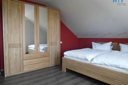 Schlafzimmer Ferienhaus Kiebitzdelle-Leegde 10 Ferienwohnung Backhaus
