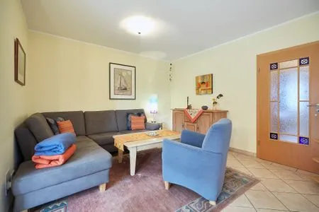 Wohnzimmer Haus Inselherz - Ferienwohnung Muschel