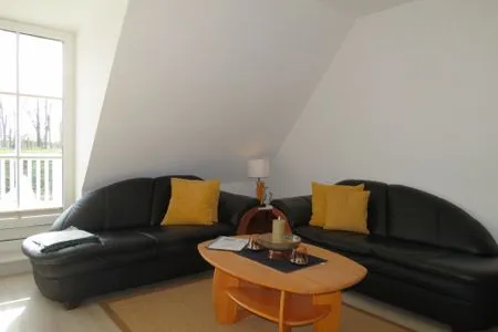 Wohnzimmer Seeschlößchen Ferienwohnung 10