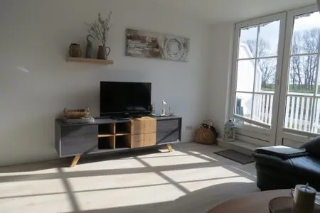 Wohnzimmer Seeschlößchen Ferienwohnung 10