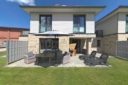 Gartenblick Wellness - Ferienhaus Ostküste