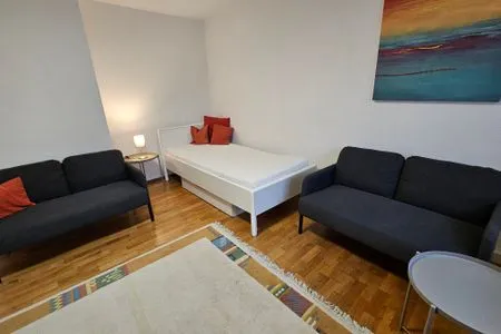 Wohnzimmer Ferienwohnung "Amperschlucht"