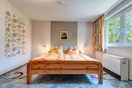 Schlafzimmer Ferienhaus zur frischen Brise, Whg. 01