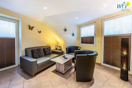 Wohnzimmer Huus an de Tune Ferienwohnung Fidellapje