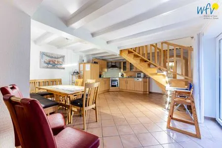 Wohnzimmer Huus an de Tune Ferienwohnung Pyrola