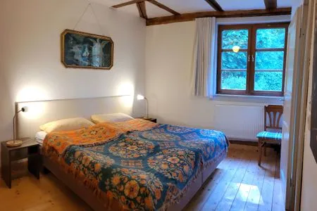 Schlafzimmer mit bequemen Bett Ferienwohnung Parkblick