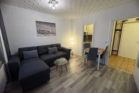 Wohnzimmer Ferienwohnung im Haus Nordland App 106 (Hund)