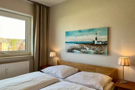 Schlafzimmer Ferienwohnung im Haus Nordland App 43